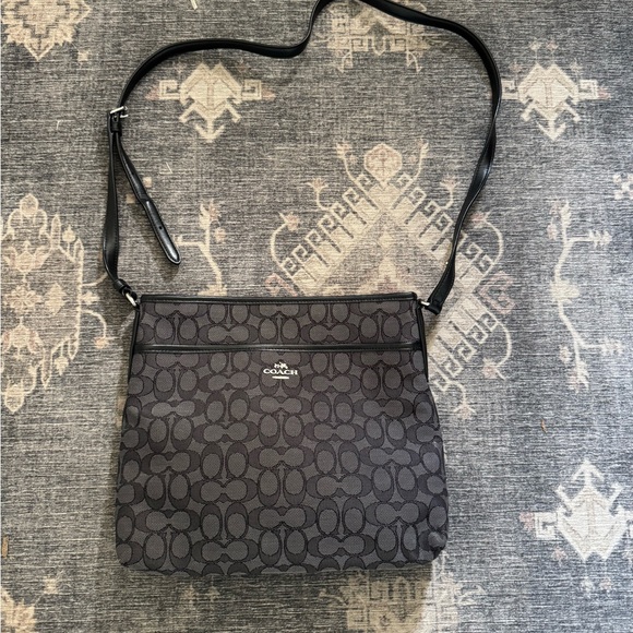 Coach Handbags - Coach Black Leather Crossbody Bag with Embossed Logo